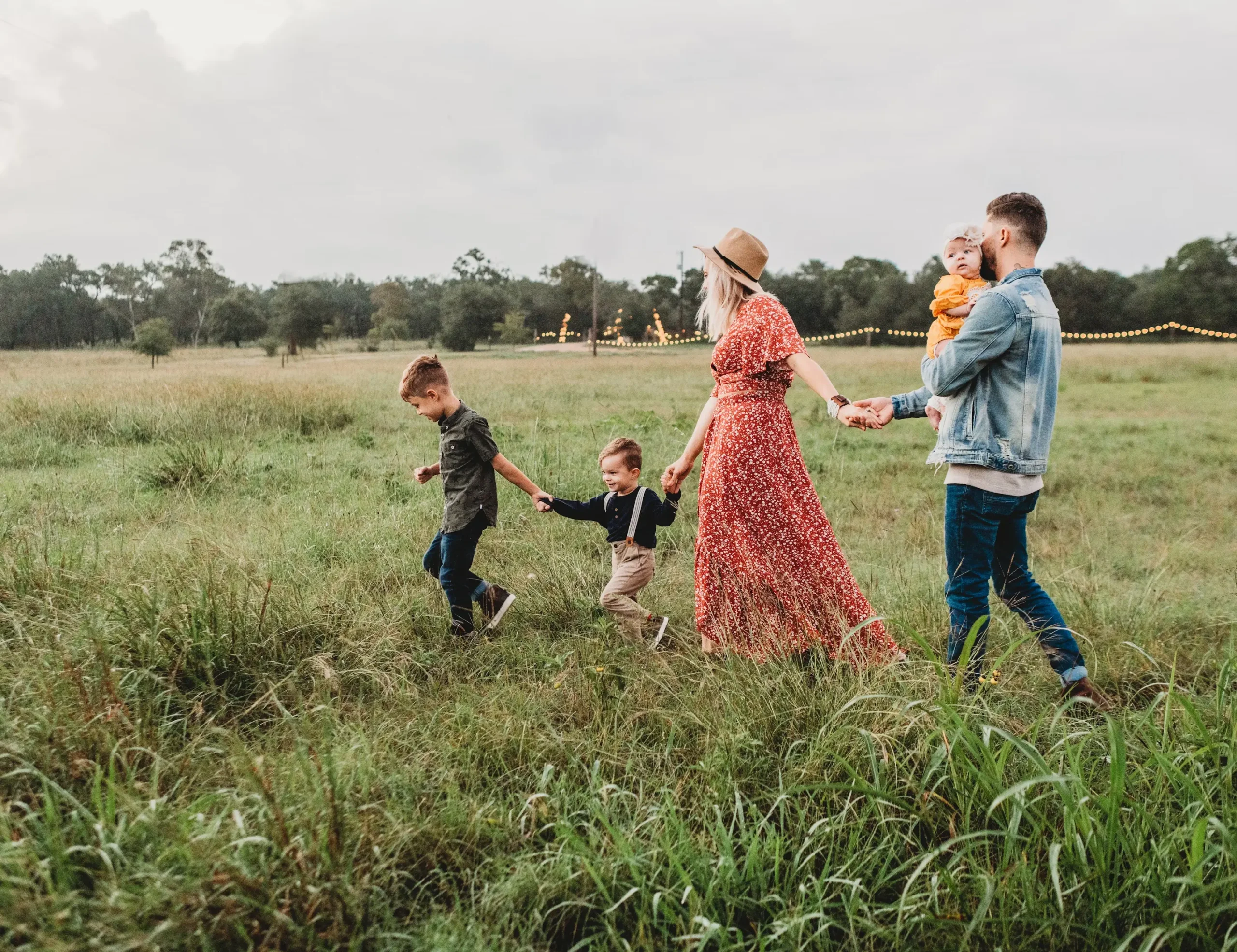 An image of a family in a field